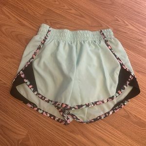 athletic works turquoise patterned shorts, size girls large(tagged for exposure)